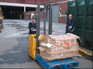 Stacker safely shifts bales of card